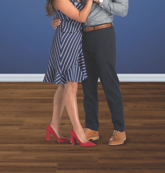 coretec-waterproof-flooring Couple dancing on flooring | Custom Floors